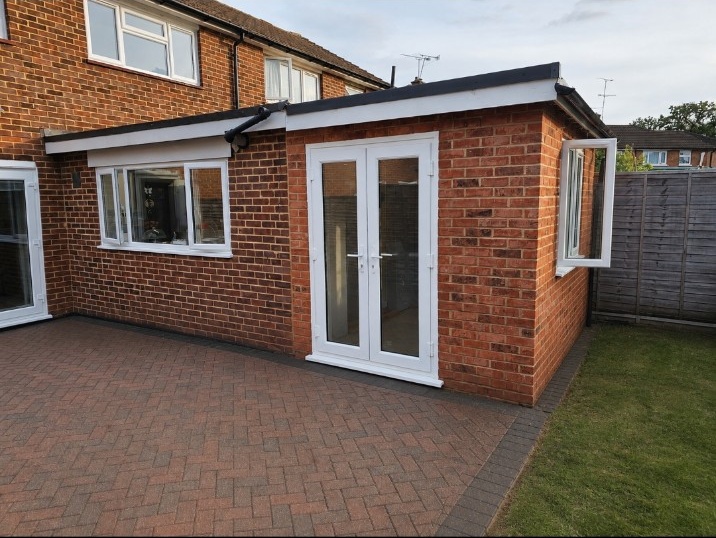Completed brick extension with French doors